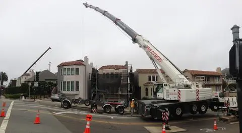 Truck Cranes Working in Tight City Spaces